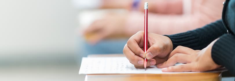 Image of someone writing