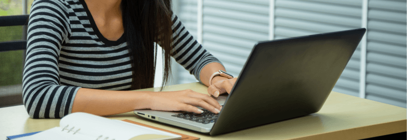 Image of someone working on a laptop