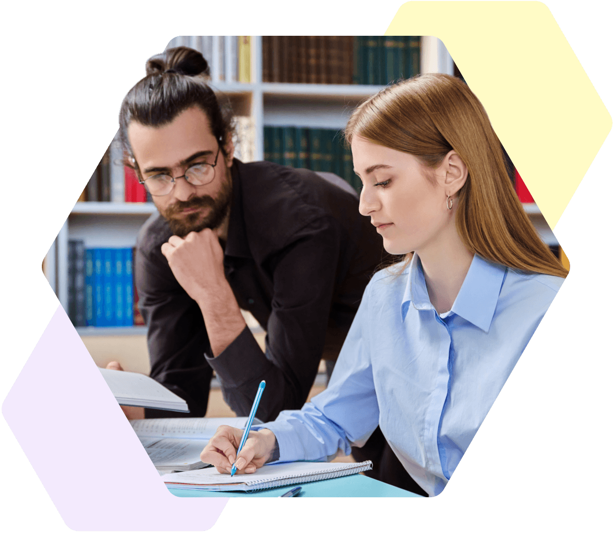 Image of a teacher helping a young person